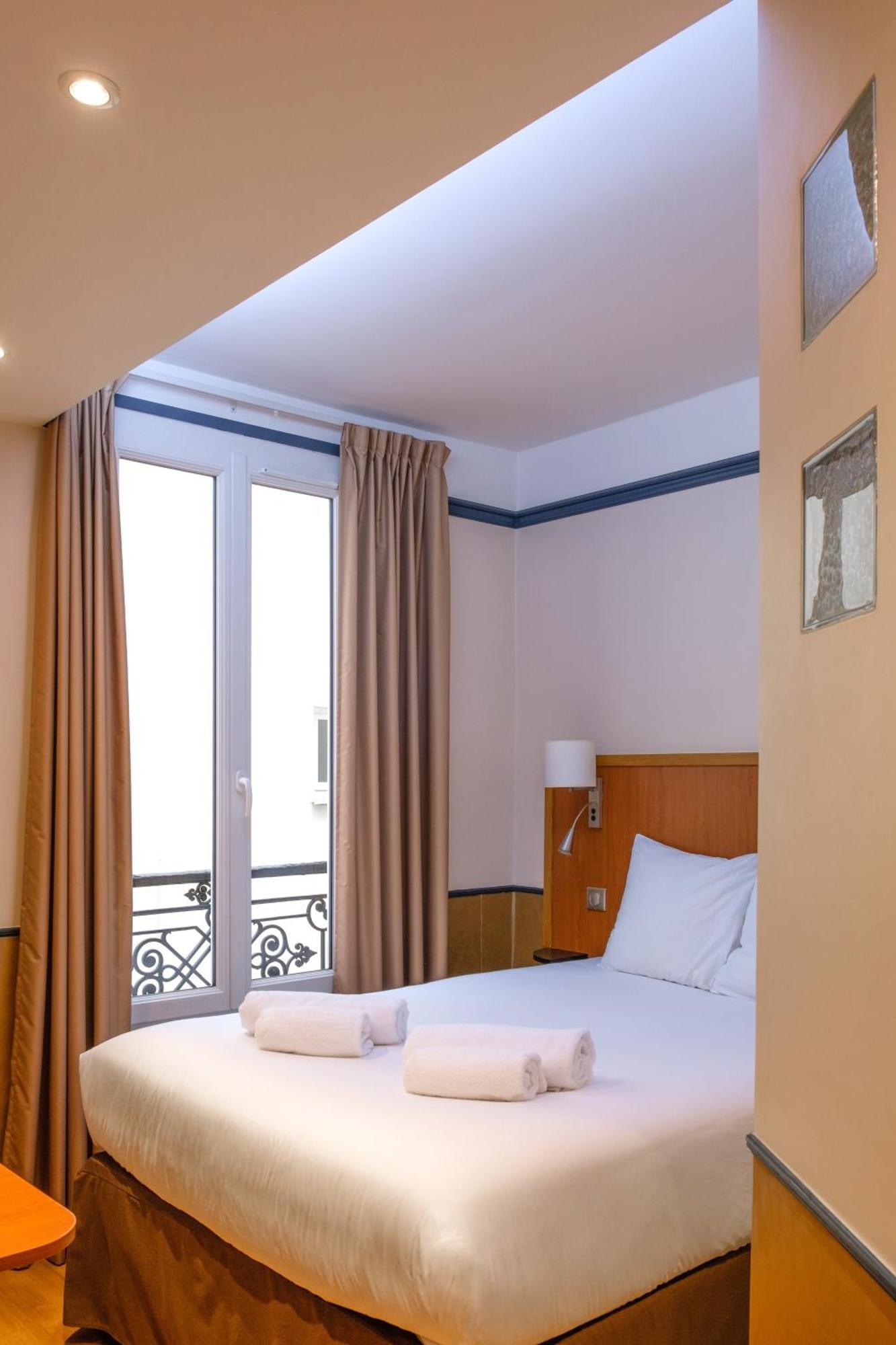 Hotel Marignan Париж Экстерьер фото